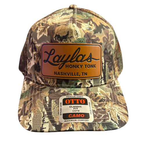 Camouflage cap with a brown leather patch featuring 'Layla's Honky Tonk Nashville, TN' on a white background.