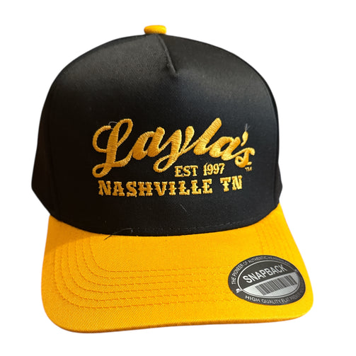 Black and yellow cap with 'Layla's Nashville TN' text on a white background